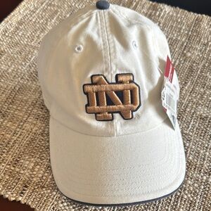 Notre Dame Cream and Gold Embroidered Cap NWT Price is firm
